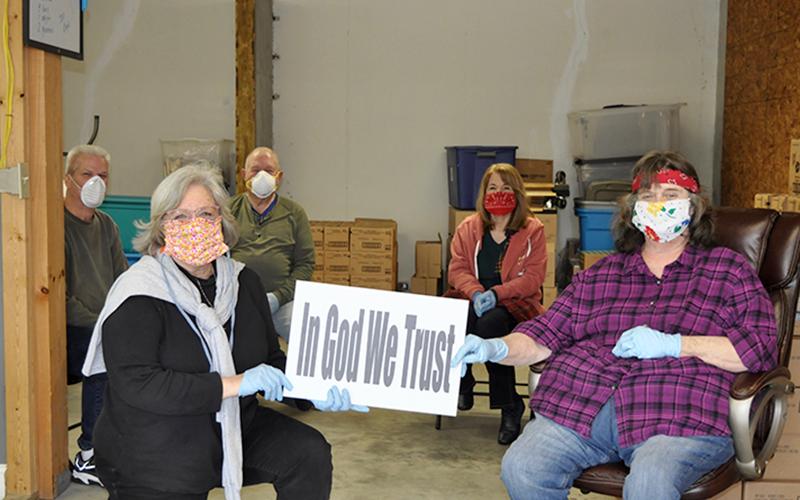 Snack in a Backpack has increased their meal distribution by 30% in response to the need the COVID-19 pandemic has caused. The organization is currently in need of donations to continue meeting the needs of Fannin County children. Shown are, from left, front, Executive Director Debby Beck and Vicki Smith; back, Paul Pangborn, Fred Wright and June Pangborn.