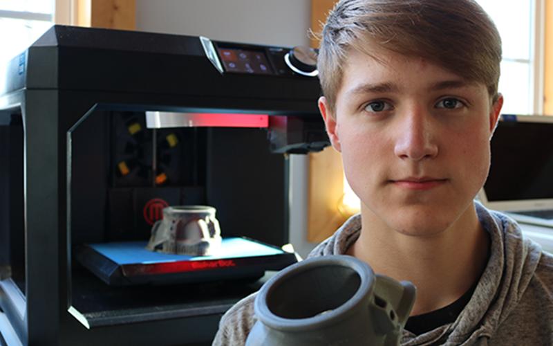 Fannin County High School student and Technology Student Association member Bryce Ware is helping to produce face masks for medical workers using the school’s 3D printer.