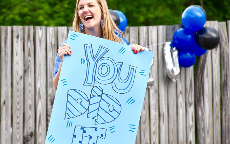 Blue Ridge Elementary School Assistant Principal Gini Tipton smiles as fifth grade students parade through the school during school’s Fifth Grade Drive-Thru Parade Tuesday, May 19.