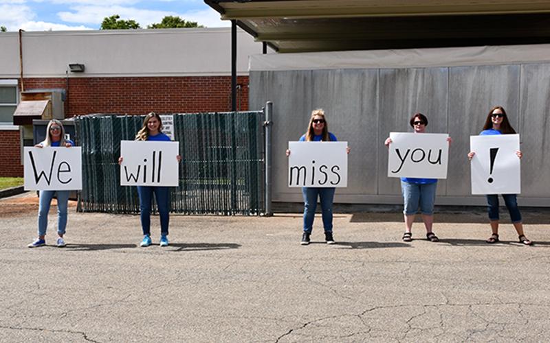 East Fannin Elementary School staff bid farewell to their fifth grade students during their Fifth Grade Parade Thursday, May 22. Shown are, from left, Kindergarten Teacher Jennifer Cochran, Long-term Substitute Gretchen Burrell, Paraprofessional Robin Stephens, Third Grade Teacher Sarah Davis and Third Grade Teacher Jill Lambert.