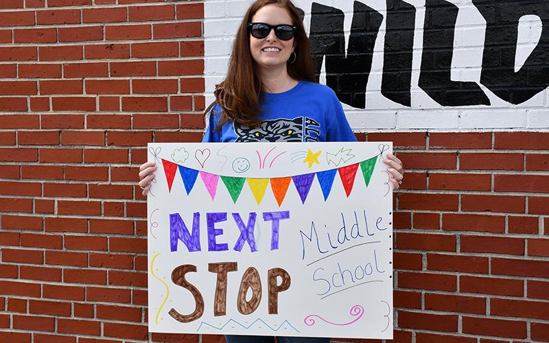 East Fannin Elementary School Third Grade Teacher Jill Lambert celebrates the school’s graduating fifth grade students’ next stop, which is middle school.