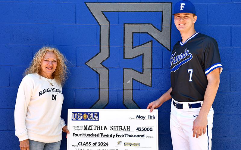 Fannin County High School Class of 2020 graduate Matthew Shirah will receive $425,000 to attend and play baseball for the United States Naval Academy starting this fall. He is shown with Blue and Gold Officer Susan Youngman.