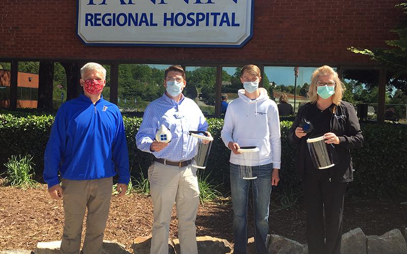 Fannin County High School freshman Bryce Ware created reusable mask, respirators and face shields for employees at Fannin Regional Hospital. Shown are, from left, Engineering teacher Bubba Gibbs, Fannin Regional Chief Executive Officer Jason Jones, Ware and Fannin Regional Executive Director of Nursing Stephanie Monico.