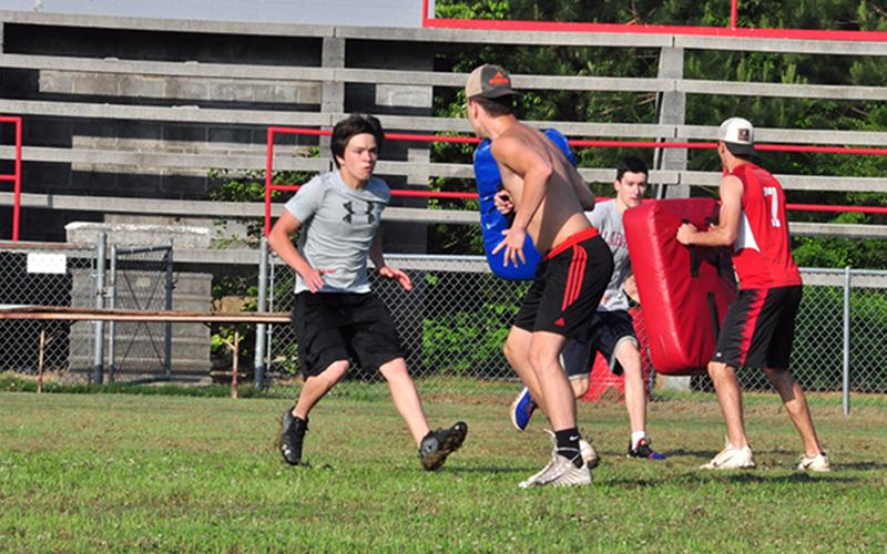 Keegan Sullivan works on a contact drill during the Copper Basin Cougar’s football team practice Thursday, June 4.