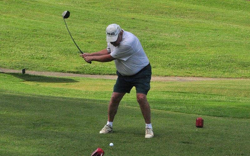 Ron Hartness loads up on a drive on the first hole at the Copper Basin Golf Club Thursday, June 11.