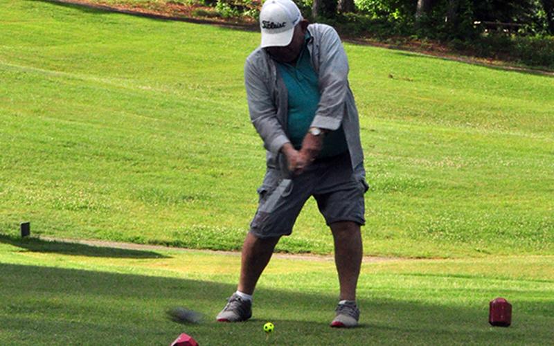 Dr. Howard Tilley tees off on hole one at the Copper Basin Golf Club Thursday, June 11.