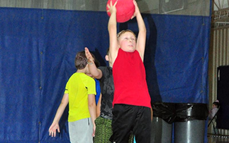 Lucas Cox catches the ball to avoid being put out during the Fannin County Recreation Department’s Summer Camp Wednesday, June 3.