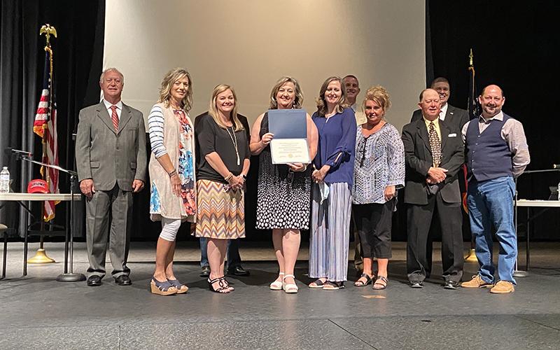 Fannin County School System Finance Director Susan Wynn received the Award of Distinction for Excellent Financial Reporting from the Georgia Department of Audits and Accounts for the fiscal year that ended June 30 of 2019. She is shown with business services team members Amy Buchanan, Pamela DeCosta, Rebecca Towe and Jill Holloway, and school board members Chad Galloway, Terry Bramlett, Lewis DeWeese, Bobby Bearden and Mike Cole.