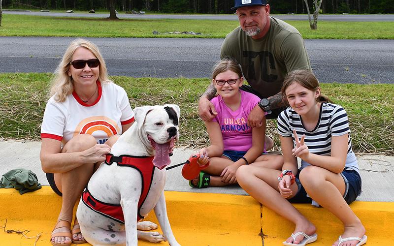 The Kelly family, consisting of Lance, Candie, Kendyl, Ryan and their dog CJ, traveled to Fannin County Middle School to eat a quick lunch before riding the ridges at the annual fundraiser for Shop with a Cop Saturday, June 27.