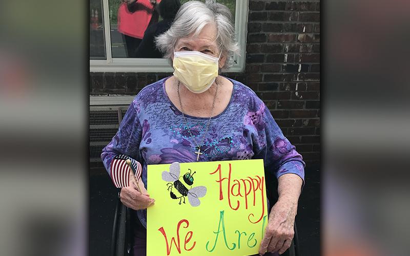 PruittHealth - Blue Ridge resident Betty Odom let her loved ones know that she and her fellow residents are happy during the center’s socially distanced drive-thru parade.