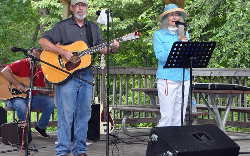 Jim and Marci Wilcox were among the performers during Pickin’ in the Park at Ron Henry Horseshoe Bend Park Thursday, July 9. Pickin’ returned to the park after being absent for almost ten months, and now continues back on schedule starting at 6 p.m. every Thursday.