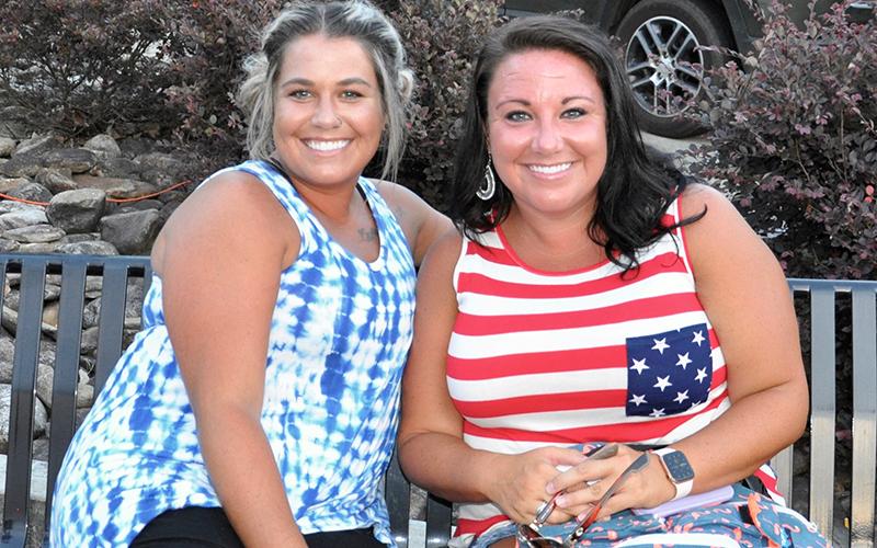 Amanda Morris, left, and Amber Henderson awaited the annual fireworks display in McCaysville Friday, July 3.