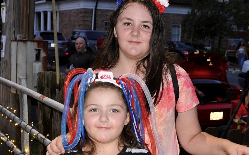 Emma, front, and Emily Pittman were thrilled to see the wonders of fireworks in celebration of America’s independence.