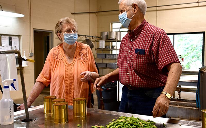 Fannin residents Nick and Bobbie Wimberley utilized the Blue Ridge Cannery to can green beans Tuesday, July 7.