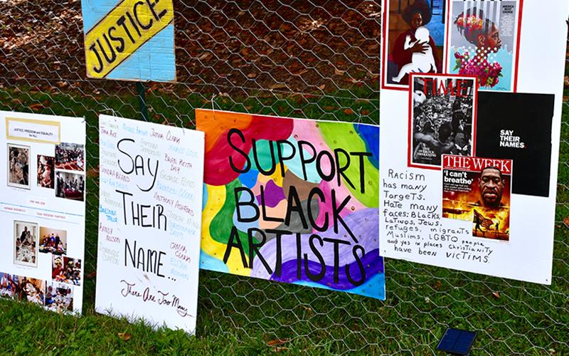 Calls for justice, the support of black artists and the remembering of black citizens who have lost their lives were reflected through multiple pieces of art at the Silent Rally for Respect, Peace, and an Equitable Future for All Monday, July 6.