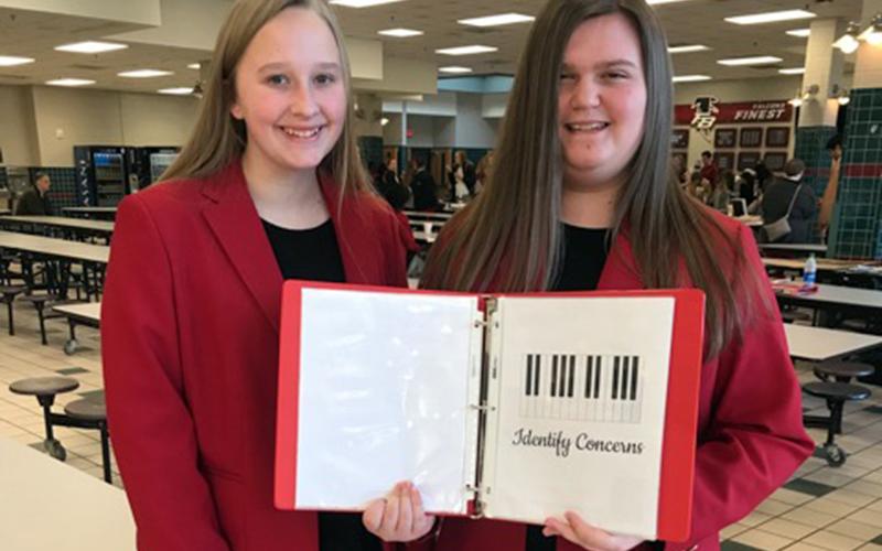 Fannin County High School Family Career and Community Leaders of America (FCCLA) members Anna Rhodes, left, and Gracie Stewart presented their Chapter Service Project Portfolio Level 2 project at this year’s national competiton, where they received first place in the nation.