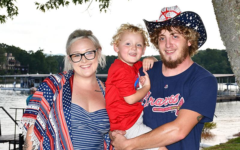 Darby, Austin and little Kaiden waited for fireworks at the Lake Blue Ridge Marina Saturday, July 4.
