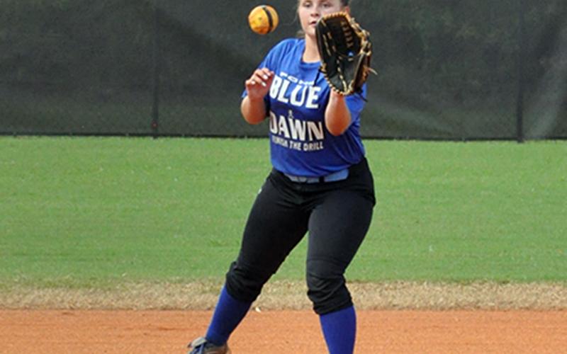 Zoe Putnam snatches a line drive in recent action for the Fannin County Lady Rebels softball team.