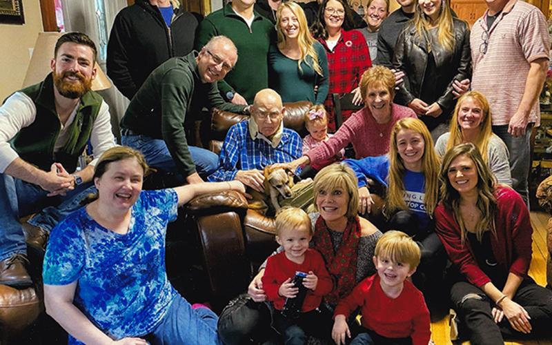The late Dr. James Haymore III can be spotted in the center of this photo, sitting with his furry companion of 19 years Tinker. The picture was taken at the Haymore’s Christmas gathering last year.