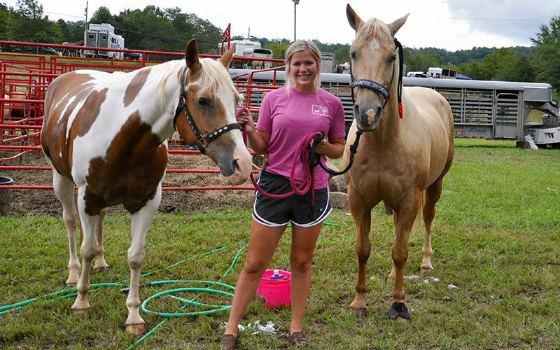 The 25th annual Kiwanis Club of Blue Ridge and Mountain Valley Motors Rodeo called for the largest amount of performers ever. Emily Heddrick is shown grooming horses before Friday nights rodeo, August 21.