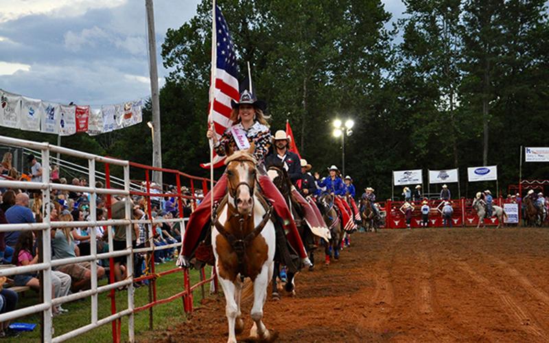 Miss Rodeo U.S.A. Brooke Wallace leads the pack, bringing Friday night’s rodeo to life, August 21.