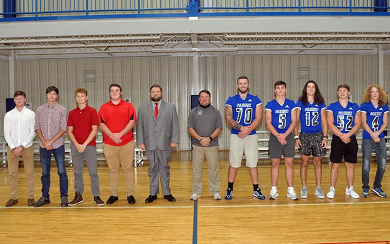 The Copper Basin Cougars and Fannin County Rebels came together Friday, August 7, to answer questions about the upcoming season during the 2020 Media Day. Shown, from left, are Cougars players, Eli Patterson, Dawson Worthy, Timothy Fair, Chance Rollins, Cougars Offensive Coordinator Jeremy Locke, Rebels Head Coach Chad Cheatham, and Rebels players Mason Bundy, Seth Reece, Luke Holloway, Micah O’Neal and Cohutta Hyde.