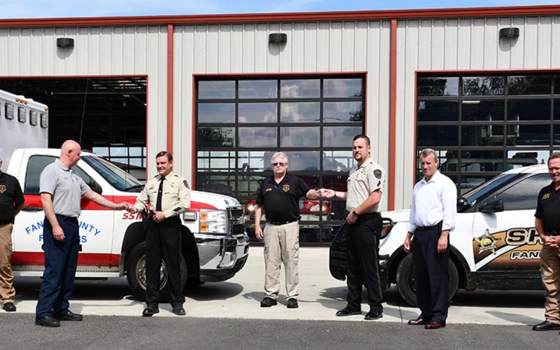 Fannin County Sherriff’s Office Investigator Gary Edwards and Corporal Dustin Carder received life saving pins, Tuesday, July 28, for adminstering Narcan at a vehicle accident before emergency medical services could get there. Shown are, from left, EMA Director Robert Graham, Paramedic Joey Cox, Edwards, EMA Deputy Director Darrell Payne, Carder, Sheriff Dane Kirby and Fire Chief Larry Thomas.