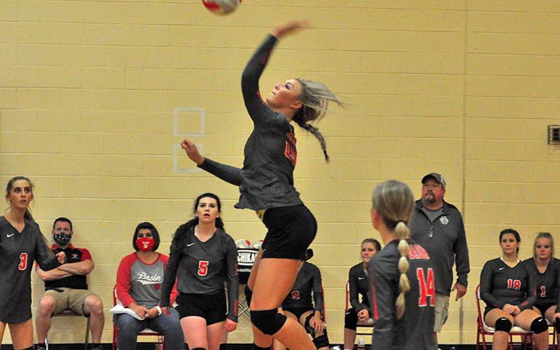 Lady Cougar Sapporiah Ross spikes the ball during the Lady Cougar’s match with the Tellico Bears Monday, August 24.