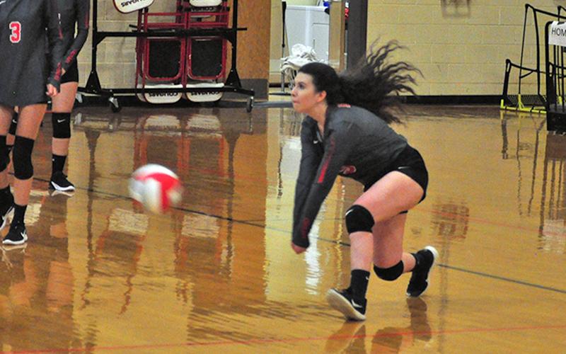 Lady Cougar Chelsea Stuart dives to keep a ball in play during Copper Basin’s game against Tyner Tuesday, August 25.