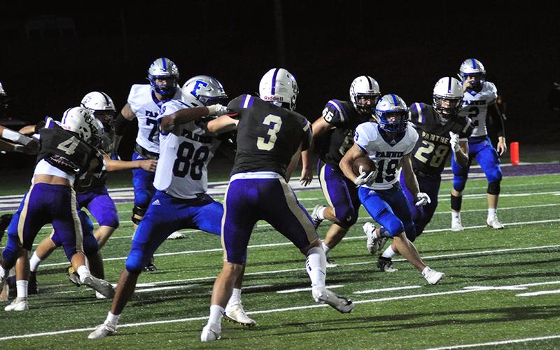 Caleb Postell (19) breaks off a big run for the Rebels during their game against Union County Friday, September 4.