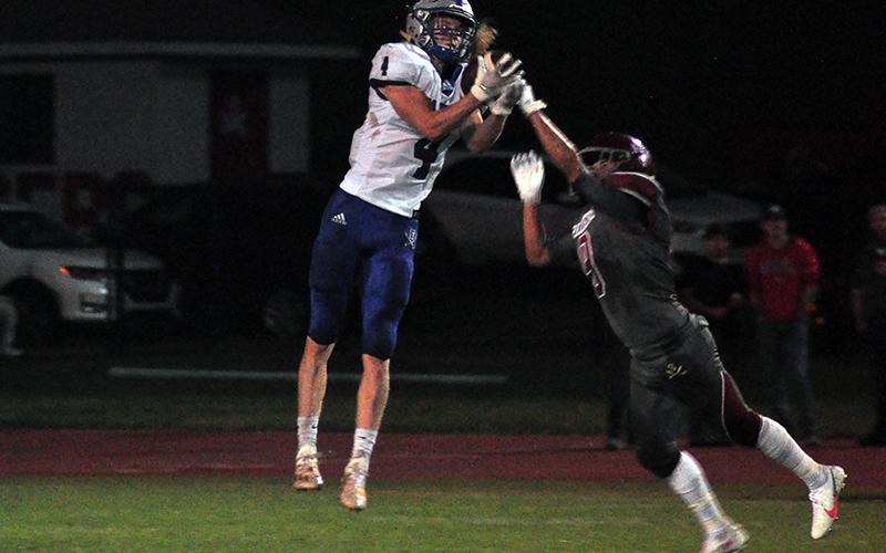 Cohutta Hyde (4) hauls in a catch for a big gain during the Rebels 48-0 win against the Southeast Whitfield Radiers Friday, September 25.