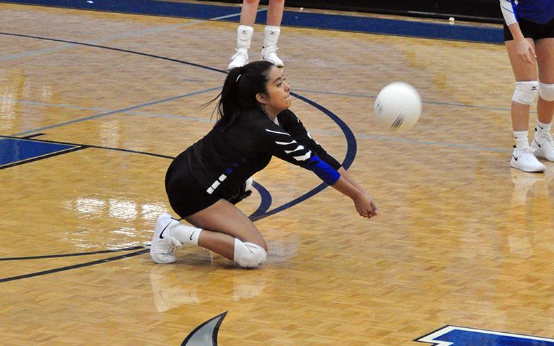 Lady Rebel senior Prisila Bautista keeps a volley alive in the Lady Rebels varsity volleyball win over Copper Basin Thursday, September 10.