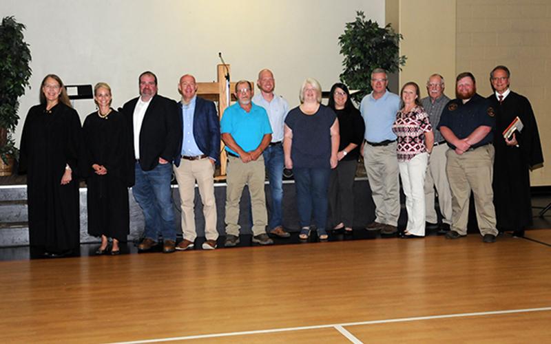 Polk County’s newly elected officials and the judges who conducted the oath-office-ceremonies Monday, August 31, at the First Baptist Church of Benton are, from left, Criminal Court Judge Sandra Donaghy, Polk County General Sessions Judge Brooklyn Townsend, Assessor of Property Jason Pankey, Constable Tim Tatum, Constable Mike Worley, school board members Nick Ratcliff, Jill Crago Rose, Angie Crowder, Robert “Robbie” Cole, Fourth Fractional Township commissioners Ronette O’Neal and Ronnie O’Neal, Constable