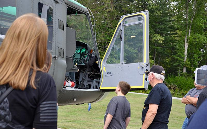 Vietnam veteran and former Huey Crew Chief Rod McIntyre opened up the Fannin County Veterans Park Huey helicopter for visitors to see.