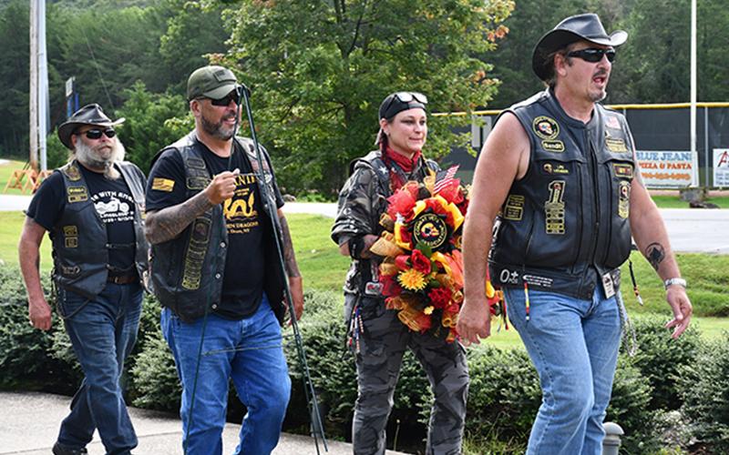 Combat Veterans Motorcycle Association State Representative Bunny Manhart spoke to the sacrifice members of the military are willing to make in order to protect citizens of the United States and the importance of remembering those who have made that ultimate sacrifice as members of the organization placed a wreath at the Fannin County Veterans Memorial Park in honor of those who lost their lives during the 9/11 terrorist attacks.