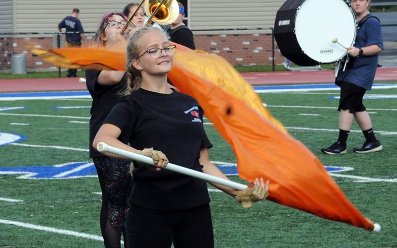Gretchen Alewel flashes a smile during the Fannin County Marching Band’s halftime performance Friday, August 28.