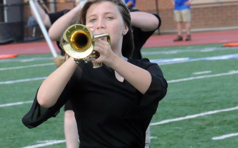 Trinidy Alderson marches to her next position during the Friday, August 28, halftime show.