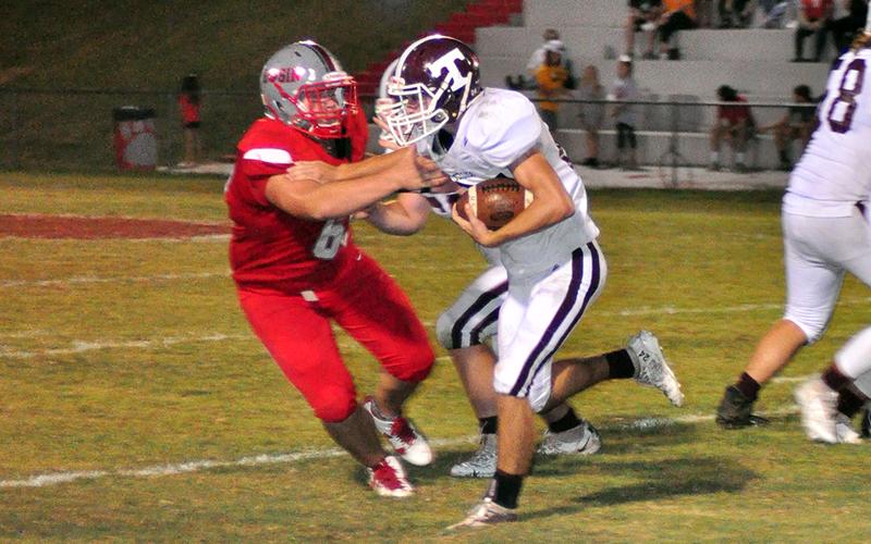 Cougar Joseph Johnson (65) fights to bring down a ball carrier in recent action for the Copper Basin Cougar football team.