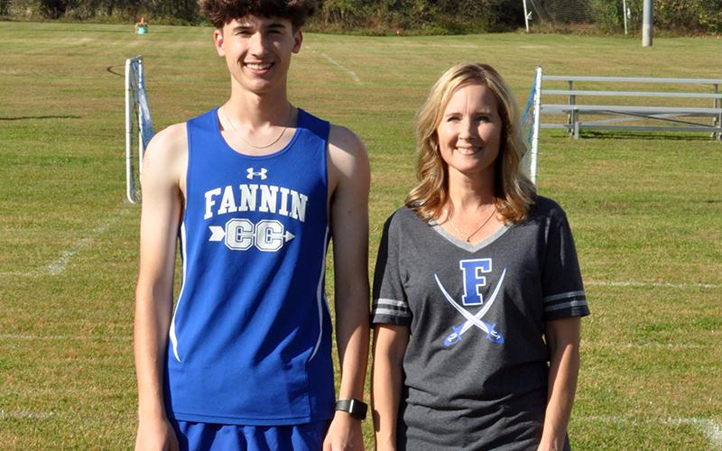 Jake Jones was one of four seniors honored before Fannin County’s cross country meet Wednesday, October 21. Jones is shown with his mother, Wendy Jones.