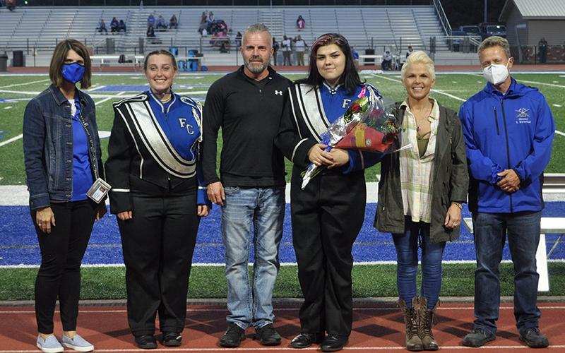 Senior band member Leah Burger was honored during Fannin County High School’s senior night ceremony  Friday, October 9. Shown are, from left, Riley Lindstrom, Jimmy Burger, Burger and Laura Jones.