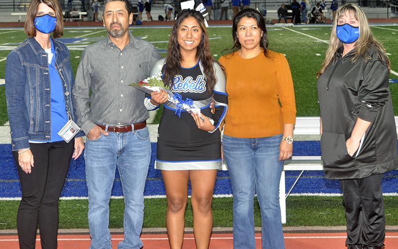 Fannin County High School honored six cheerleading seniors on senior night Friday, October 9. Shown are, from left, father, Ruben Rosas, Rosas and mother, Josefina Rosas.
