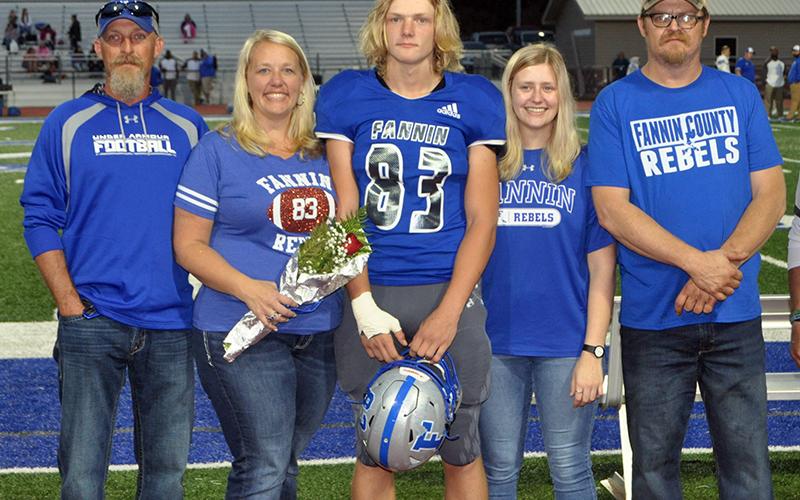 Dalton Ross was honored along with 14 other seniors during Fannin County High School’s senior night Friday, October 9. Shown are, from left, stepfather, Kevin Dilbeck, mother, Pearl Dilbeck, Ross, sister, Roxie Ross and father, Chris Ross.