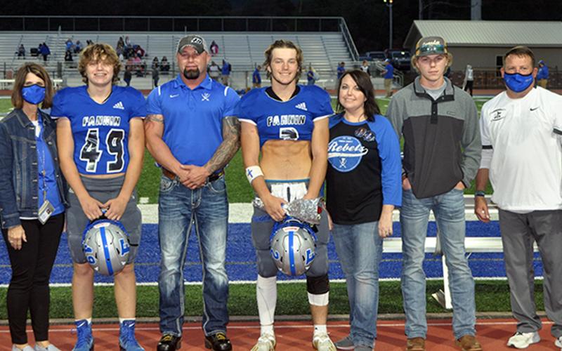 Jake Sands was honored, along with 15 other seniors before the Rebels game against Gordon Central Friday, October 9. Shown are, from left, brother, Cade Sands, father, Mike Sands, Sands, mother, Holly Sands and brother, Zach Sands.