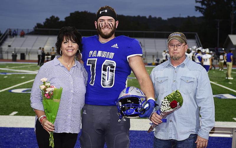 Mason Bundy was one of 15 football seniors to be honored during Fannin County’s senior night, before the game against Gordon Central Friday, October 9. Bundy is shown with his mother, Dena Johnson, and stepfather, Chris Johnson.