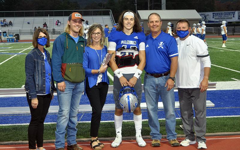 Luke Holloway was one of 15 football seniors to be honored during Fannin County’s senior night, before the game against Gordon Central Friday, October 9. Shown are, from left, brother, Clay Holloway, mother, Jill Holloway, Holloway and father, Pat Holloway.