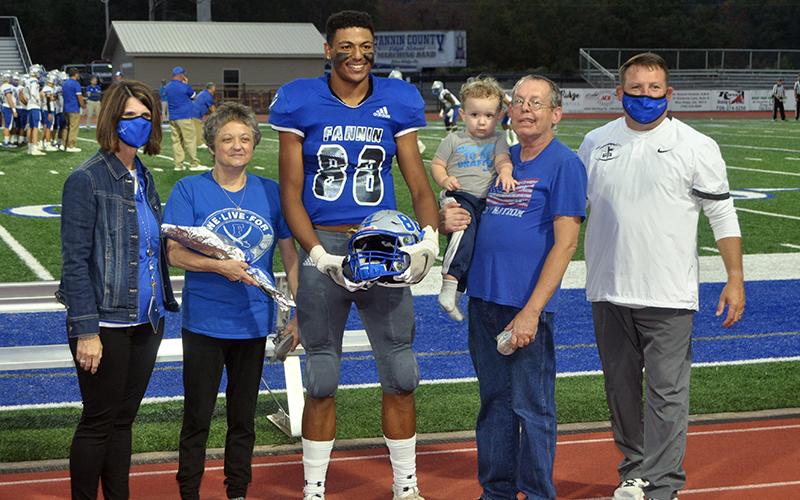 Jaylin Ingram was one of 15 football seniors honored during senior night at Fannin County High School Friday, October 9. Ingram is shown with Rhonda and Jeff Ingram.