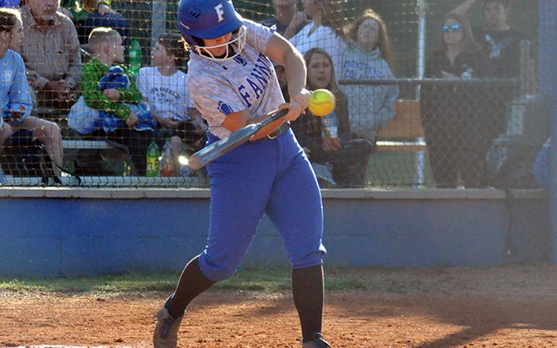 Lady Rebel Chelsey Fry hits a ball during Fannin County’s game with the Coosa Eagles Wednesday, September 30.