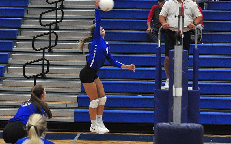 Lady Rebel Becca Ledford spikes the ball in recent action for the Fannin County volleyball team.