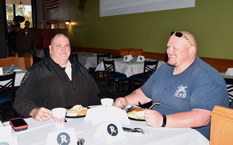 Fannin County Sheriff’s Office Sergeant John Bramlett, left, and Firefighter/Paramedic Mathew Kerry joined their fellow first responders for a breakfast meal hosted the “Ridge Men” from The Ridge Community Church Friday, October 16.