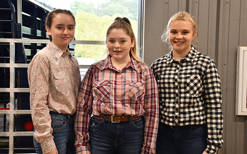 FFA and 4-H students participated in the Fannin County Youth Fair at the Fannin County Agriculture Facility Saturday, September 28. Shown are, from left, Kaleighann Ware, Alyssa Marshall and Tamra Couch.